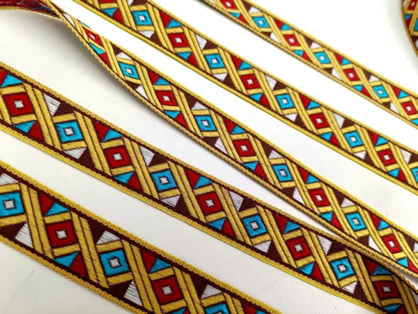 jacquardborte-gelb-rot-tuerkis-braun-ethno-muster-rauten-zierband-22mm-meterware