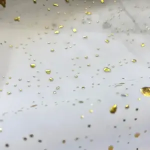 uni-weiss-netz-tupfen-gold-stoff
